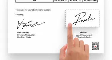A finger placing a signature on a signed agreement beside the other signer’s mark