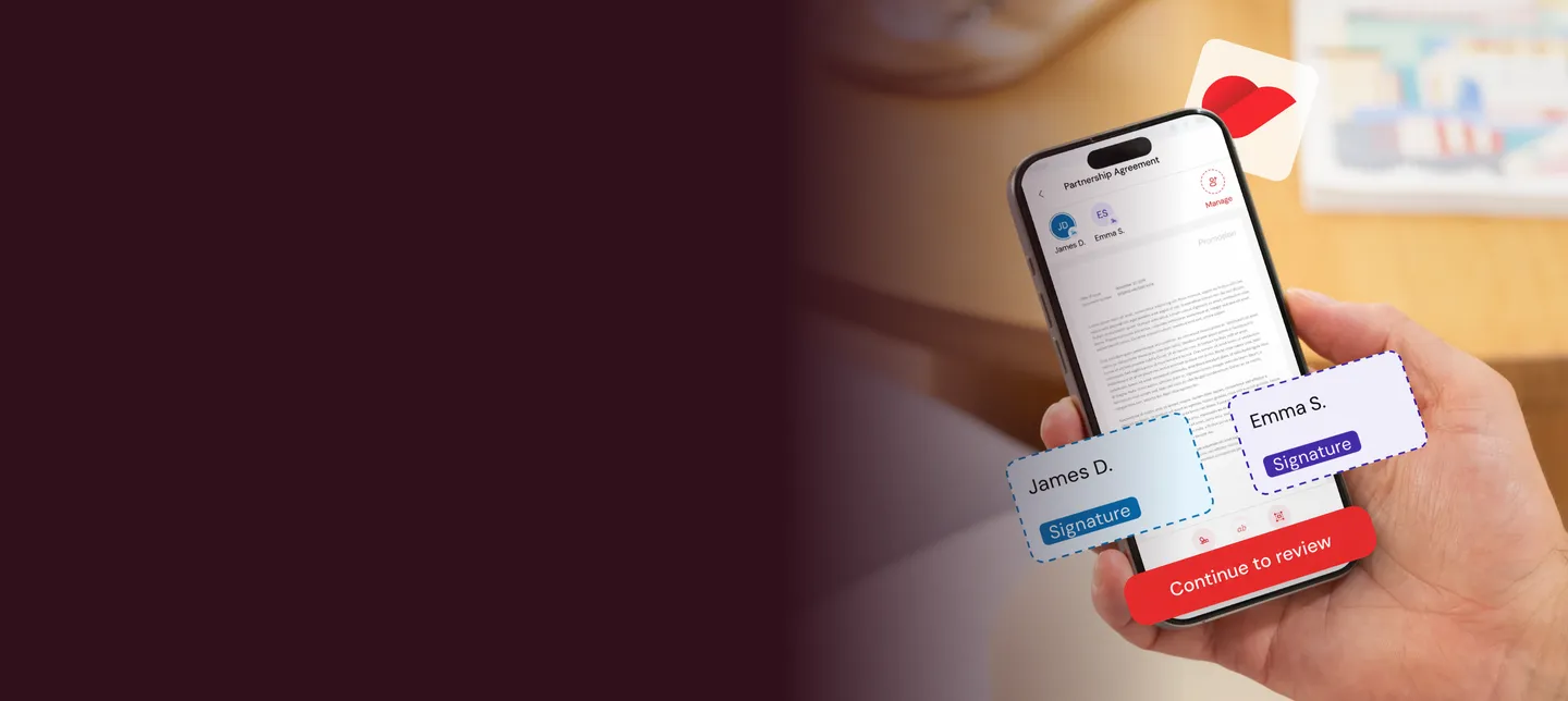 A hand holding a phone showing a partnership agreement ready for two signatures, with signature fields for James D. and Emma S.